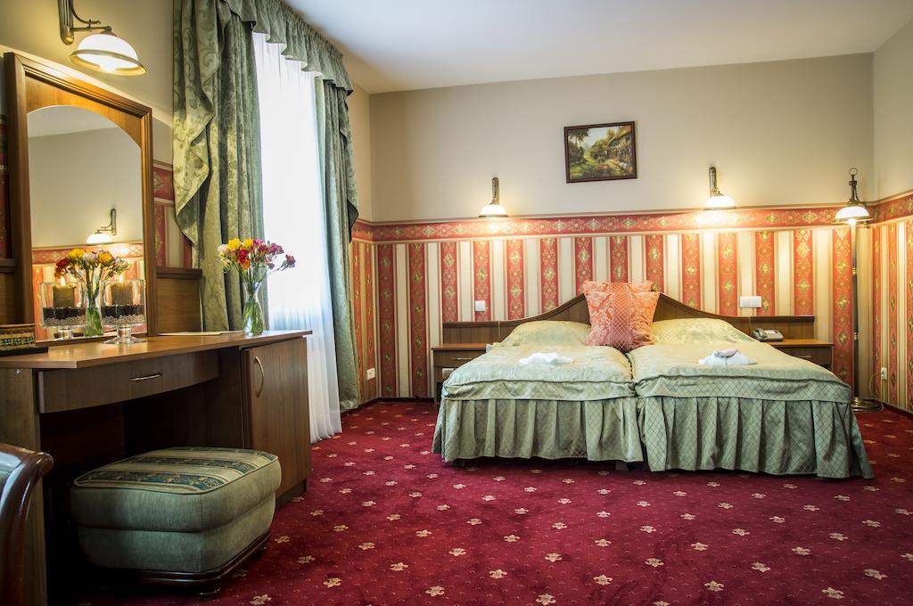 Hotel Mazurski Dworek Mikołajki Rom bilde
